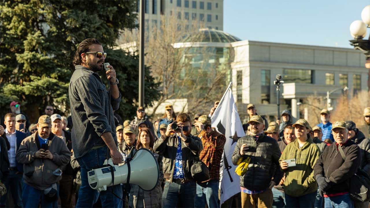 YouTube gun channel celebrity Brandon Herrera speaks Tuesday morning in front of the Colorado Capitol building at a rally protesting a proposed “assault weapons ban” bill. (Courtesy of National Association For Gun Rights)